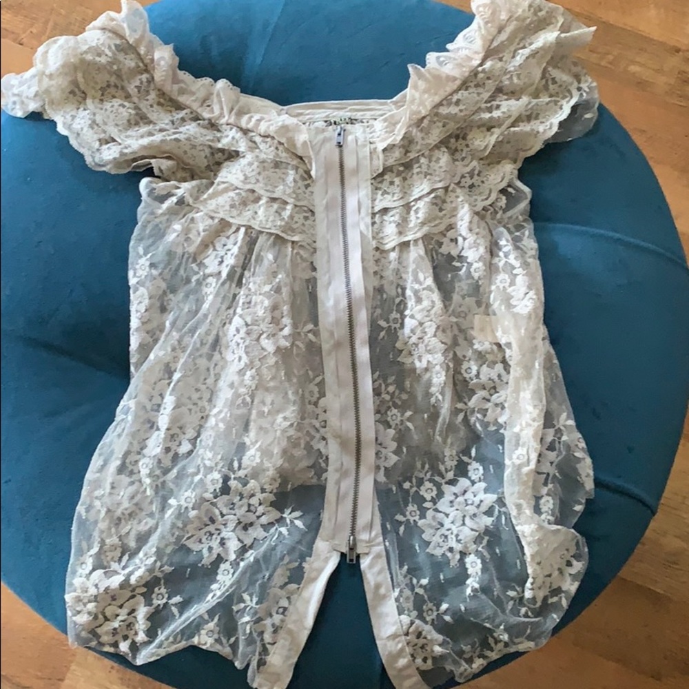 Lace over shirt.